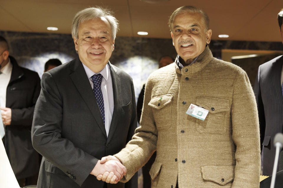 U.N. Secretary-General Antonio Guterres, left, shakes hand with the Prime Minister of Pakistan Shehbaz Sharif, right, during the International Conference on Climate-Resilient Pakistan, at the European headquarters of the United Nation, in Geneva, Switzerland, Monday, Jan. 9, 2023. (Salvatore Di Nolfi/Keystone via AP)