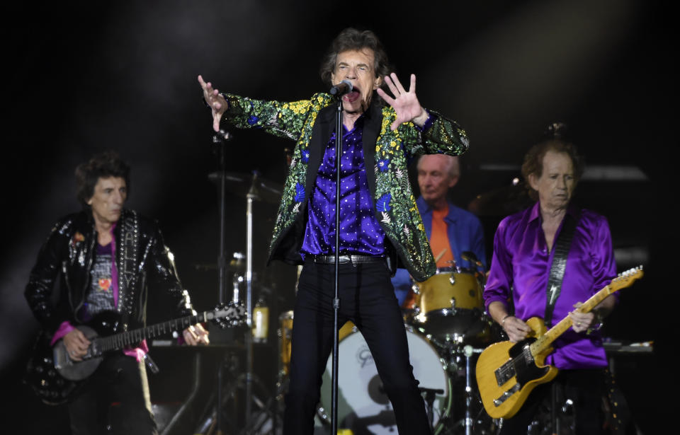 Mick Jagger, center, performs with his Rolling Stones bandmates, from left, Ron Wood, Charlie Watts and Keith Richards during their concert at the Rose Bowl, Thursday, Aug. 22, 2019, in Pasadena, Calif. (Photo by Chris Pizzello/Invision/AP)