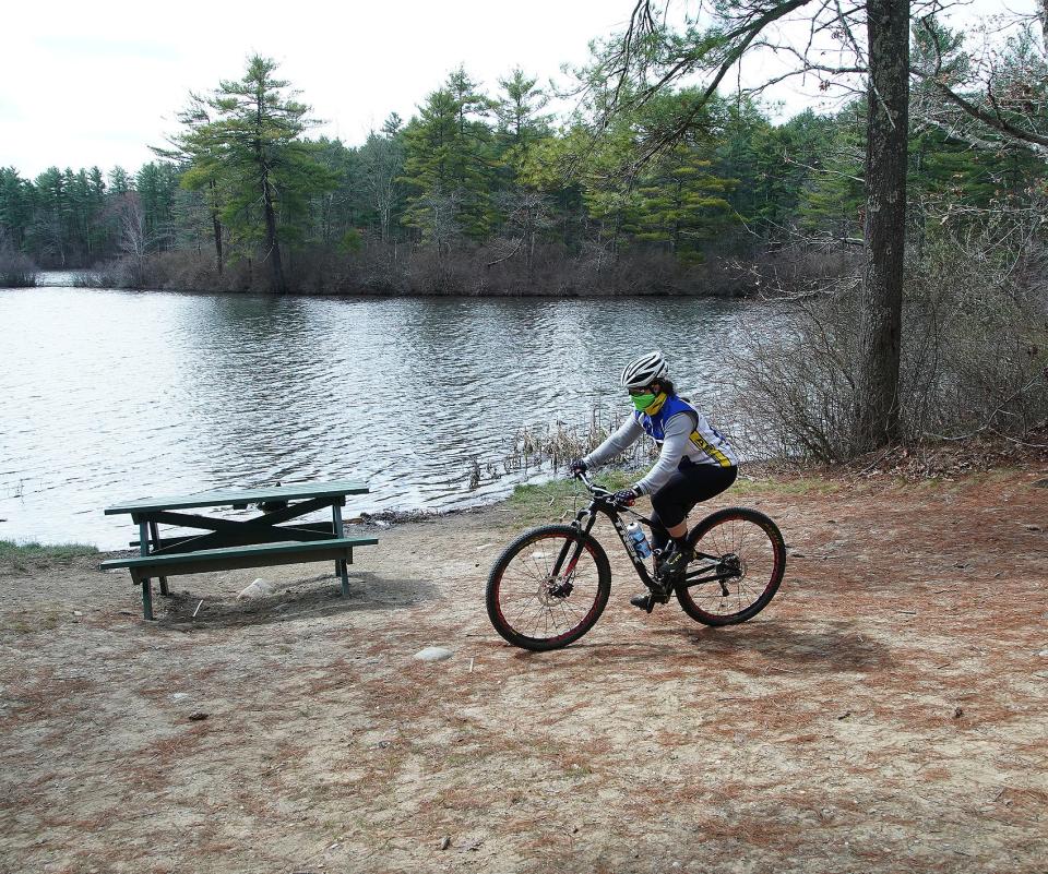 Monica Avery of East Bridgewater is ready for a mountain bike ride at Massasoit State Park in East Taunton Wednesday April 14, 2021.