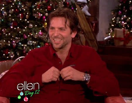 Bradley Cooper unbuttons his shirt to reveal his secret. Photo: The Ellen DeGeneres Show