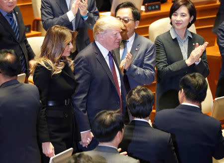 U.S. President Donald Trump and first lady Melania arrive at the South Korean National Assembly in Seoul, South Korea, November 8, 2017. REUTERS/Jonathan Ernst