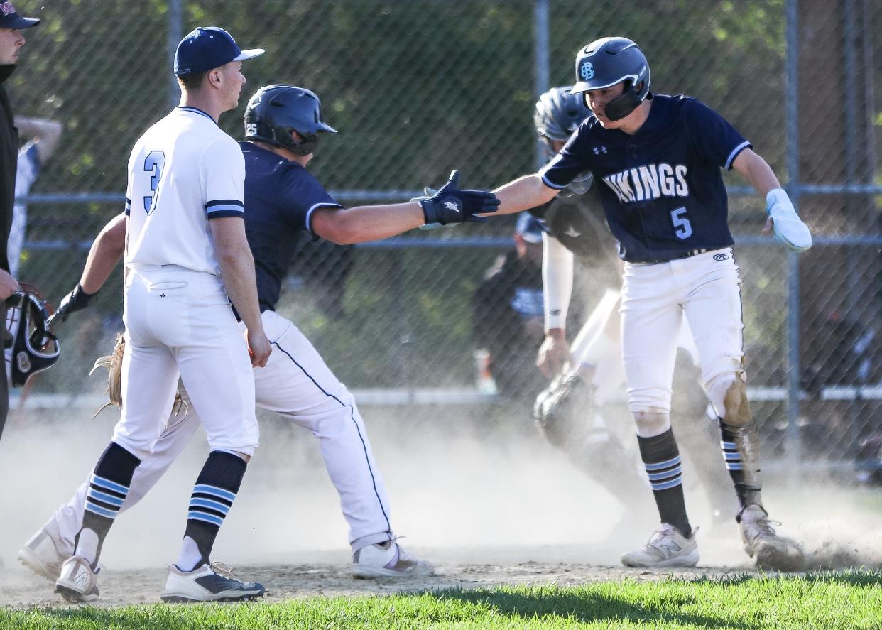 East Bridgewater's Brody Lovell celebrates after scoring a run during a game against Bristol-Plymouth at Hopewell Park in Taunton on Monday, April 29, 2024.