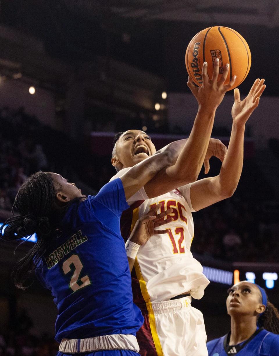 USC star Juju Watkins is fouled by Texas A&M Corpus Christi guard Timberlyn Criswell