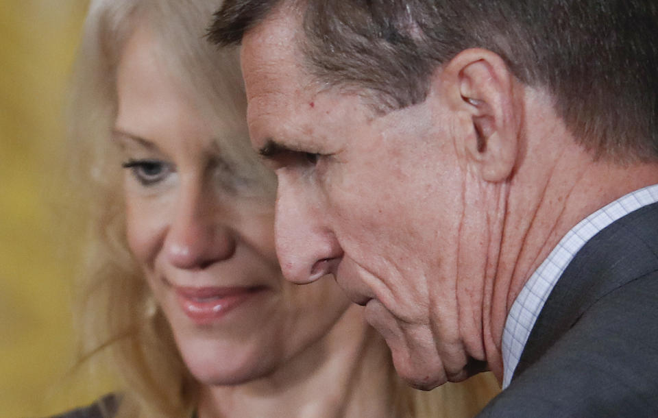 FILE- In this Monday, Feb. 13, 2017, file photo, National Security Adviser Michael Flynn and Counselor to the President Kellyanne Conway take their seats before the start of a joint news conference with President Donald Trump and Canadian Prime Minister Justin Trudeau in the East Room of the White House in Washington. Flynn resigned as Trump's national security adviser Monday. (AP Photo/Pablo Martinez Monsivais, File)