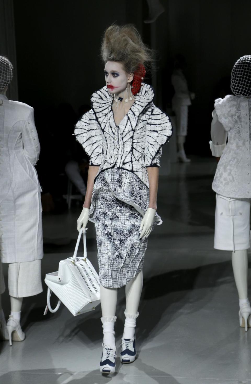 The Thom Browne Spring 2014 collection is modeled during Fashion Week in New York, Monday, Sept. 9, 2013. (AP Photo/Seth Wenig)