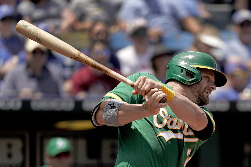 Oakland Athletics' Stephen Vogt watches his RBI single during the fourth inning of a baseball game against the Kansas City Royals Sunday, June 26, 2022, in Kansas City, Mo. (AP Photo/Charlie Riedel)