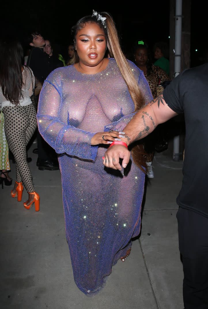 Lizzo steps out wearing an eye-catching look for Cardi B’s birthday party in Los Angeles on Oct. 11. - Credit: MEGA