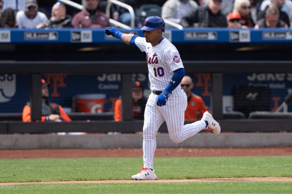 New York Mets third baseman Eduardo Escobar (10) rounds the bases after hitting a home run against the San Francisco Giants during the second inning at Citi Field.