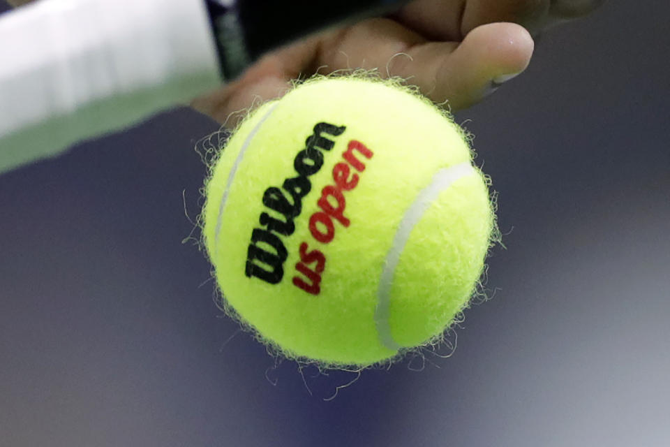 FILE - Nick Kyrgios, of Australia, tosses a tennis ball before serving to Andrey Rublev, of Russia, during the third round of the U.S. Open tennis tournament in New York, in this Saturday, Aug. 31, 2019, file photo. The first round of the 2021 U.S. Open is scheduled for Monday, Aug. 30. (AP Photo/Adam Hunger, File)