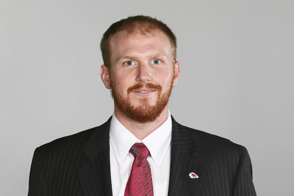 FILE- In a June 20, 2016 file photo, Kansas City Chiefs assistant coach Britt Reid is shown. Reid has been charged with driving while intoxicated after a crash that critically injured a 5-year-old girl. Jackson County prosecutors announced the charges Monday, April 12, 2021, against Reid, the son of Chiefs Coach Andy Reid. Prosecutors allege Reid was driving about 84 mph and had a blood-alcohol level of .113 about a half-hour after the crash near Arrowhead Stadium on Feb. 4. Police say his truck slammed into two cars stopped along an entrance ramp to Interstate 435 near the Chiefs' training facility. Five-year-old Ariel Young, who was in one of the cars, suffered a traumatic brain injury. (AP Photo)