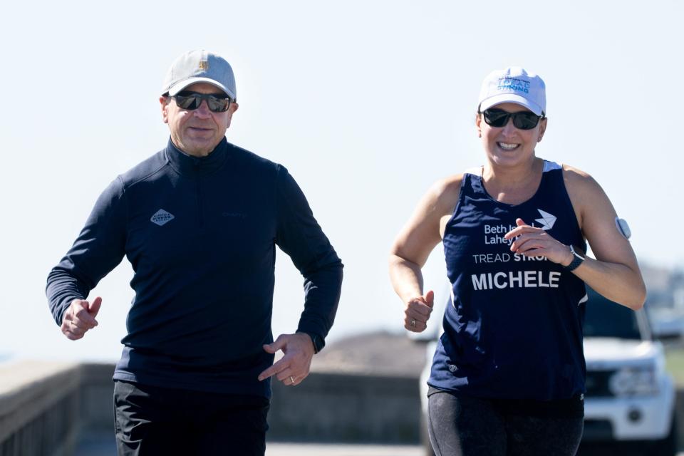 Jim and Michele Gilbert train for the Boston Marathon in Narragansett.