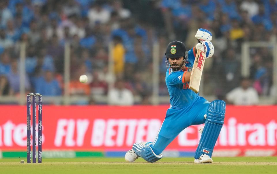 Virat Kohli cover drives for four