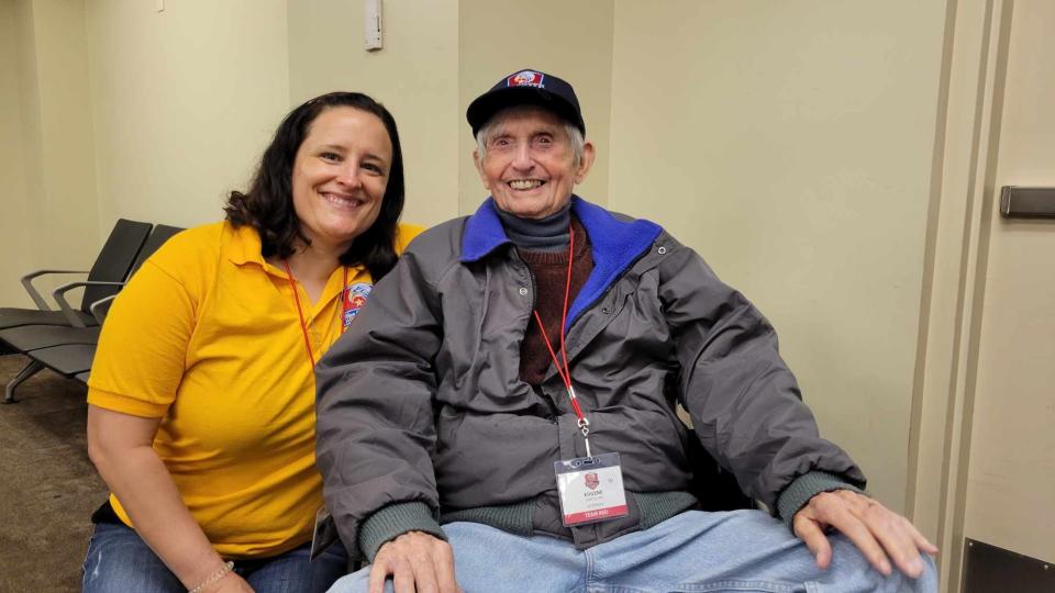 guardian Jennifer DeWaters with the Oct. 14 flight's lone World War II veteran, Eugene Jaroslaw of Asheville.