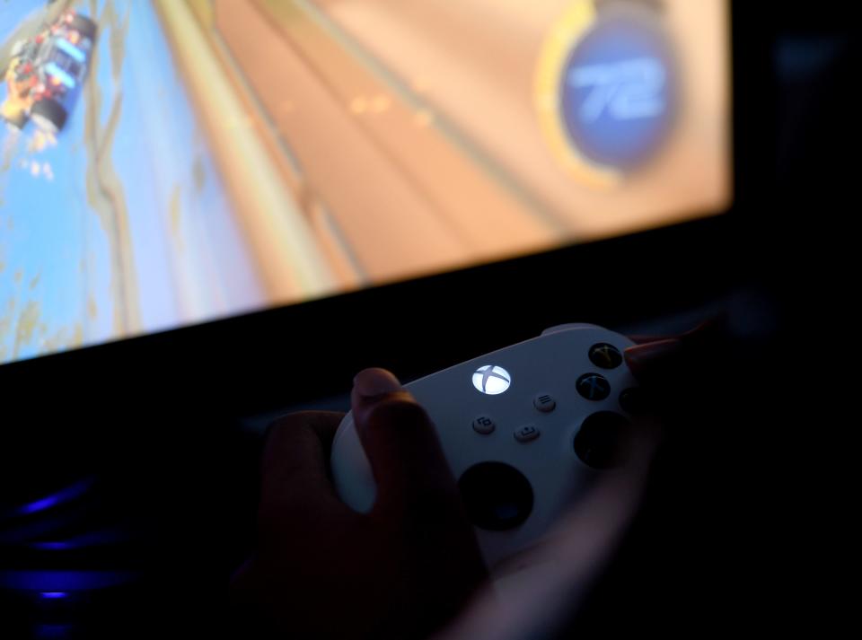 An esports participant plays a video game.