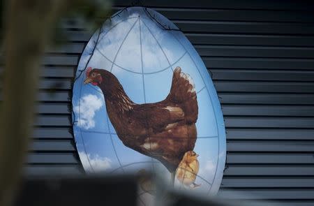 A logo is seen at the entrance of a poultry farm, where a highly contagious strain of bird flu was found by Dutch authorities, in Hekendorp November 17, 2014. REUTERS/Marco De Swart