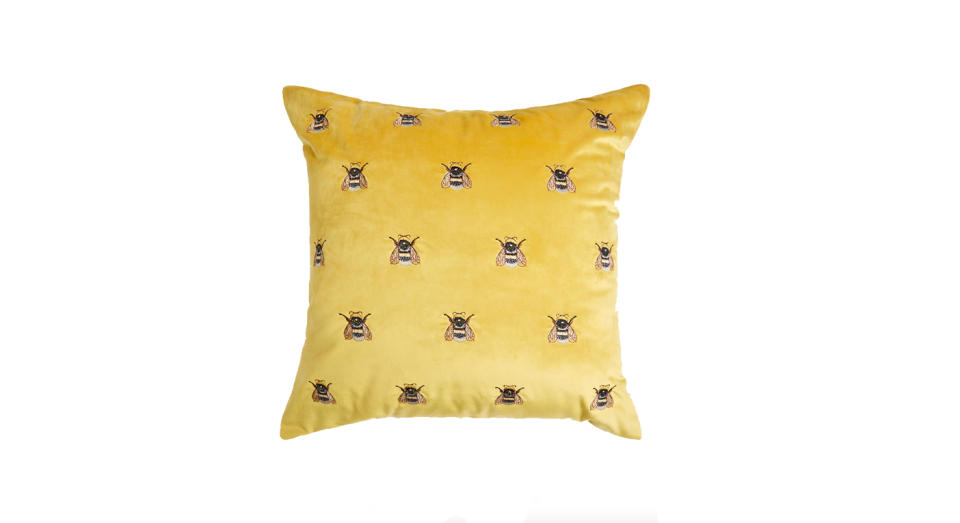 This fun bee print will add a splash of ochre to any living room. 