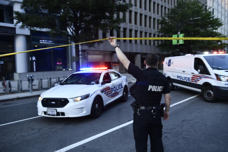 Police activity at the entrance to Pennsylvania Avenue near the White House shortly after Secret Service guards shot a person who was apparently armed, outside the White House on August 10, 2020 while US President Donald Trump was speaking to the press in the Brady Briefing Room of the White House in Washington, DC. - Secret Service guards shot a person, who was apparently armed, outside the White House on August 10, 2020. President Donald Trump said just after being briefly evacuated in the middle of a press conference. (Photo by Brendan Smialowski / AFP) (Photo by BRENDAN SMIALOWSKI/AFP via Getty Images)