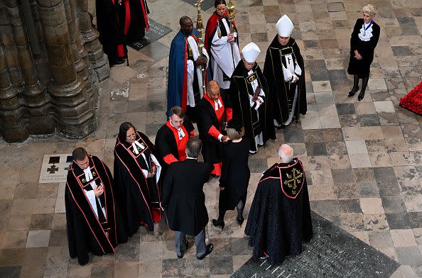 LONDON, ENGLAND - SEPTEMBER 19: Prime Minister of the United Kingdom Liz Truss and Hugh O'Leary shake hands with members of the Clergy at the State Funeral of Queen Elizabeth II at Westminster Abbey on September 19, 2022 in London, England. Elizabeth Alexandra Mary Windsor was born in Bruton Street, Mayfair, London on 21 April 1926. She married Prince Philip in 1947 and ascended the throne of the United Kingdom and Commonwealth on 6 February 1952 after the death of her Father, King George VI. Queen Elizabeth II died at Balmoral Castle in Scotland on September 8, 2022, and is succeeded by her eldest son, King Charles III.  (Photo by Gareth Cattermole/Getty Images)