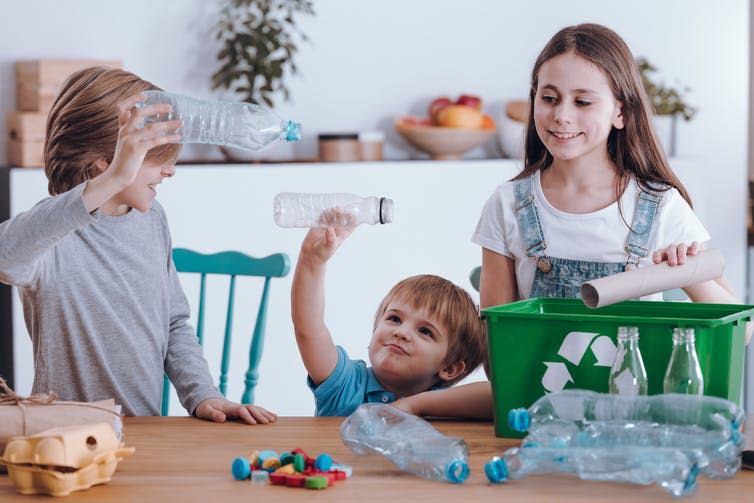 <span class="caption">Plastic bottles and boxes that might normally be recycled can be used for creative play.</span> <span class="attribution"><a class="link " href="https://www.shutterstock.com/image-photo/siblings-having-fun-while-segregating-waste-1065450635" rel="nofollow noopener" target="_blank" data-ylk="slk:Photographee.eu/Shutterstock;elm:context_link;itc:0;sec:content-canvas">Photographee.eu/Shutterstock</a></span>