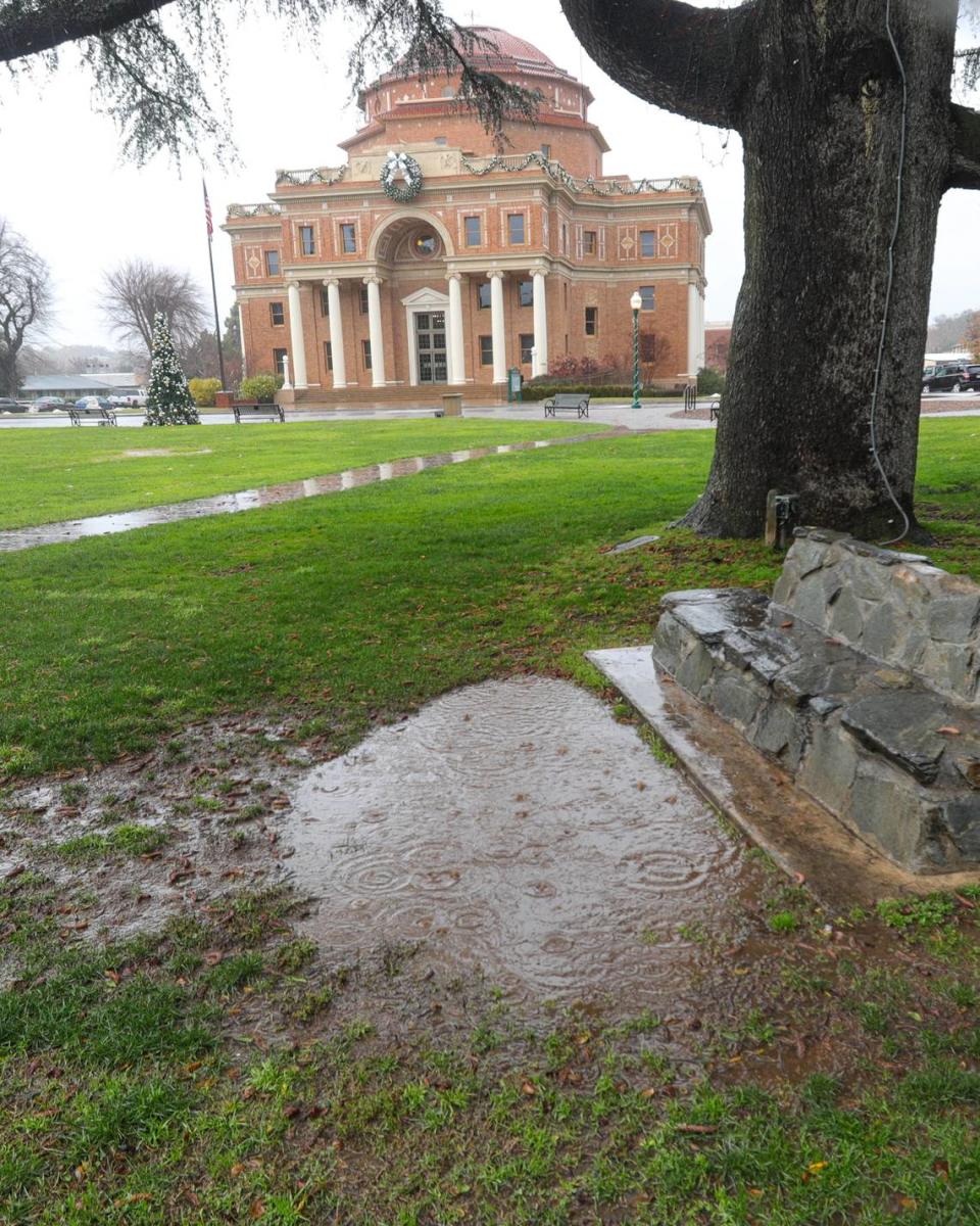 Raindrops fill a puddle in Sunken Gardens on a rainy Monday in Atascadero, Dec. 27, 2021.