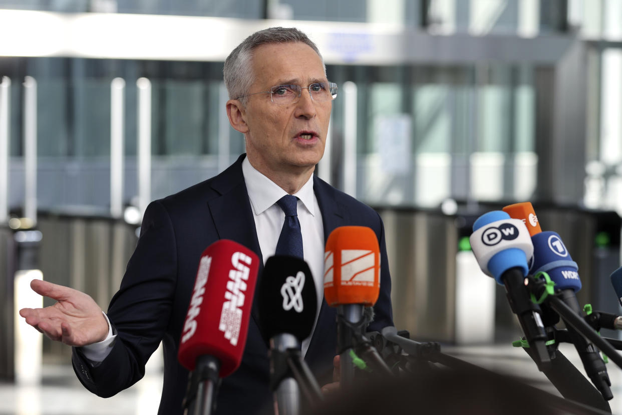 NATO Secretary General Jens Stoltenberg speaks with the media as he arrives for a meeting of NATO foreign ministers at NATO headquarters in Brussels, Tuesday, April 4, 2023. (AP Photo/Geert Vanden Wijngaert)