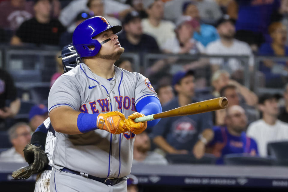 New York Mets' Daniel Vogelbach watches his two-run home run scoring Pete Alonso in the seventh inning of a baseball game against the New York Yankees, Monday, Aug. 22, 2022, in New York. (AP Photo/Corey Sipkin)