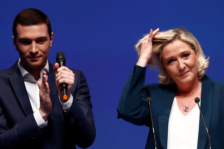 French far-right National Rally (Rassemblement National) party leader Marine Le Pen and Jordan Bardella, the head of the National Rally list for the European elections, attend the launching of their party campaign for the European elections in Paris, France, January 13, 2019. REUTERS/Christian Hartmann