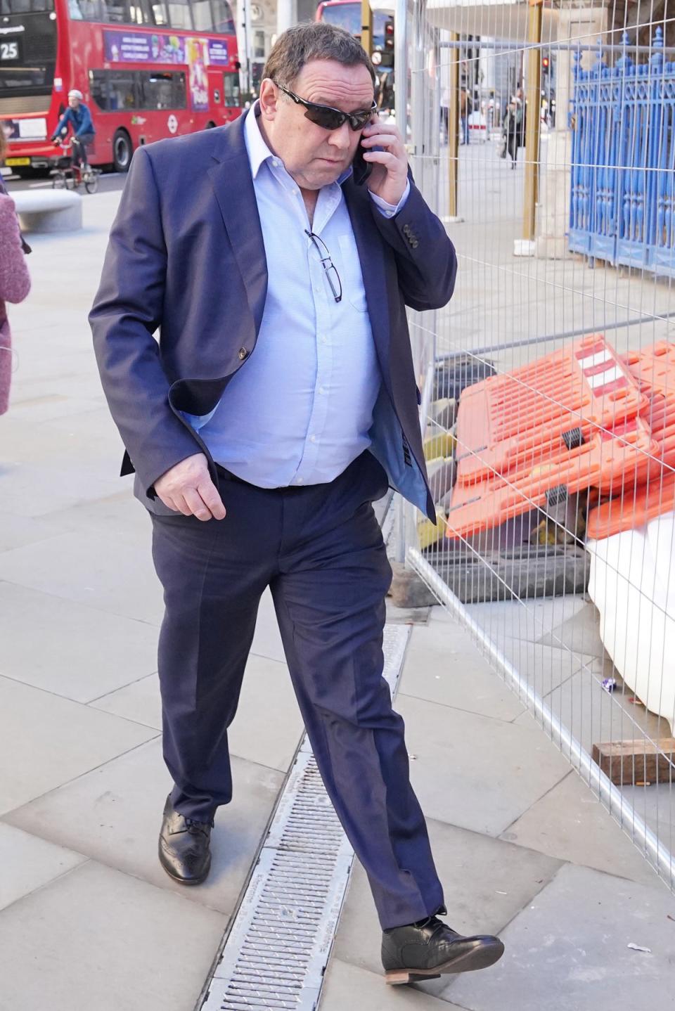 Former Metropolitan Police officer Robert Lewis arrives at the City Of London Magistrates' Court (PA)