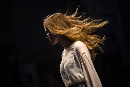 A model presents a creation during a run through before the GS Lingerie Show featuring Wonderbra, Anna Sui & Spanx Fall 2014 collection during New York Fashion Week February 4, 2014. REUTERS/Eric Thayer