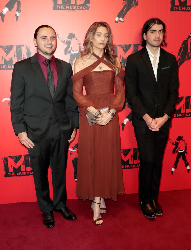 paris jackson walking the red carpet wearing terracotta midi dress