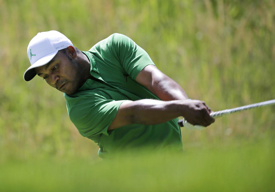 Harold Varner III drives off the fourth tee during the third round of the PGA Championship golf tournament, Saturday, May 18, 2019, at Bethpage Black in Farmingdale, N.Y. (AP Photo/Seth Wenig)