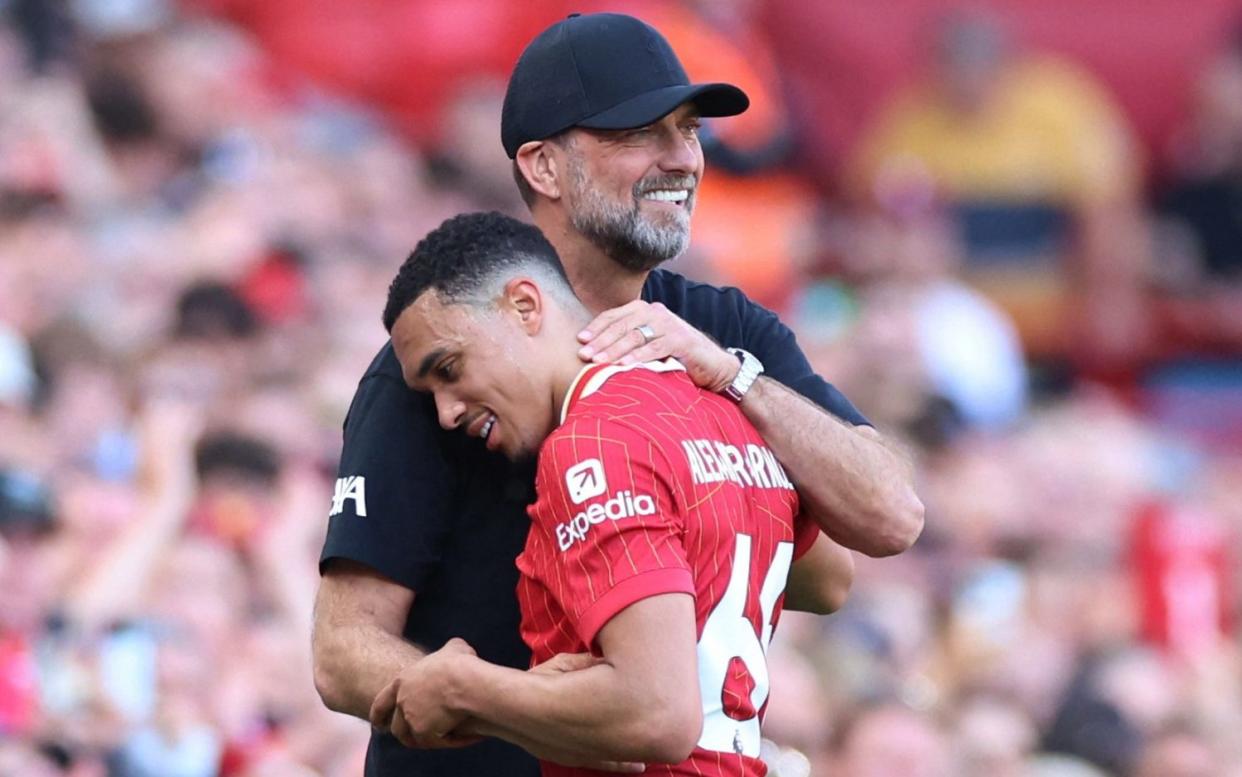 Trent Alexander-Arnold embraces manager Jurgen Klopp after being substituted