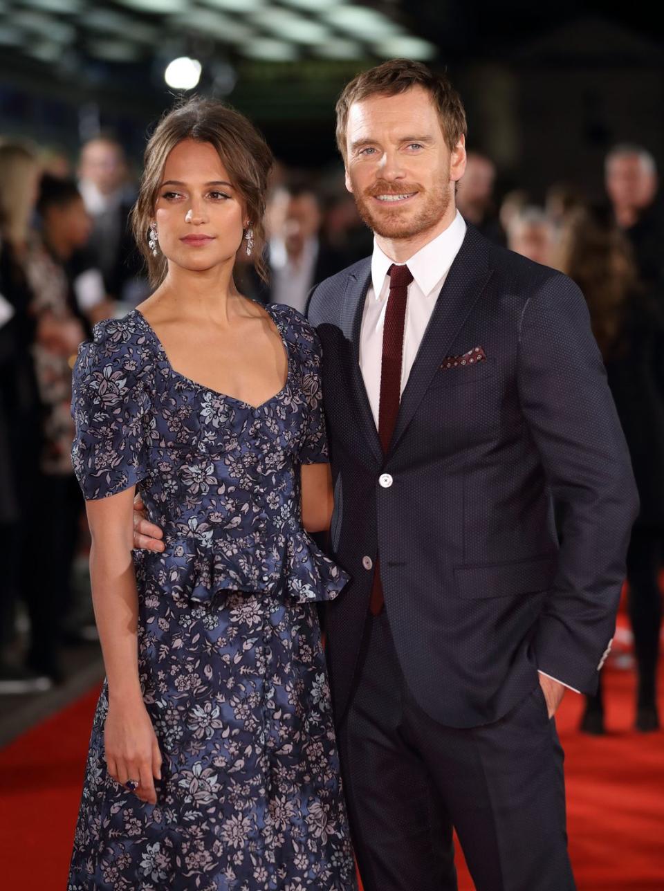 <p>Alicia Vikander, 31, and husband Michael Fassbender, 43, started dating back in 2014 after meeting on the set of <em>The Light Between Oceans</em>. The lovebirds kept it low-key for the cameras at the beginning of their relationship, but were outed as a newlyweds after they returned from their <a href="https://www.harpersbazaar.com/celebrity/latest/a13031336/alicia-vikander-michael-fassbender-married/" rel="nofollow noopener" target="_blank" data-ylk="slk:incognito wedding in Ibiza;elm:context_link;itc:0;sec:content-canvas" class="link ">incognito wedding in Ibiza</a> in 2017.</p>