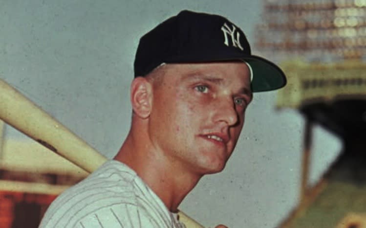 Roger Maris son Rudy Maris waves to the crowd before throwing out the  ceremonial first pitch for the New York Yankees against the Pittsburgh  Pirates March 18th, 2007 at Legends Field in