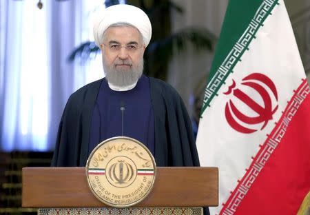 Iranian President Hassan Rouhani attend a news conference with Swiss President Johann Schneider-Ammann in Tehran February 27, 2016.REUTERS/Raheb Homavandi/TIMA