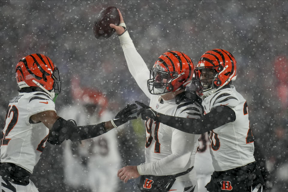 Cincinnati Bengals defensive end Trey Hendrickson (91) reacts after recovering a fumble by the Buffalo Bills during the fourth quarter of an NFL division round football game, Sunday, Jan. 22, 2023, in Orchard Park, N.Y. (AP Photo/Seth Wenig)