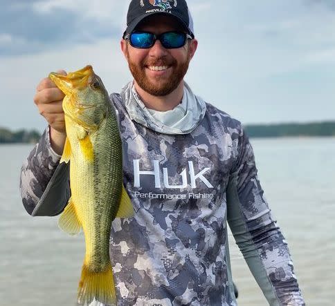 Josh Rogers landed a rare golden-hued largemouth bass. (Photo: Arkansas Wildlife Magazine)