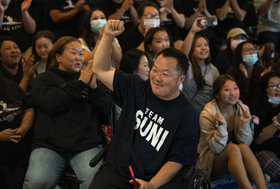 John Lee, father of Sunisa Lee of Team United States, celebrates after she won gold in the Women's All-Around gymnastics Final on day six of the Tokyo 2020 Olympic Games at a watch party on July 29, 2021 in Oakdale, Minnesota. / Credit: Stephen Maturen / Getty Images