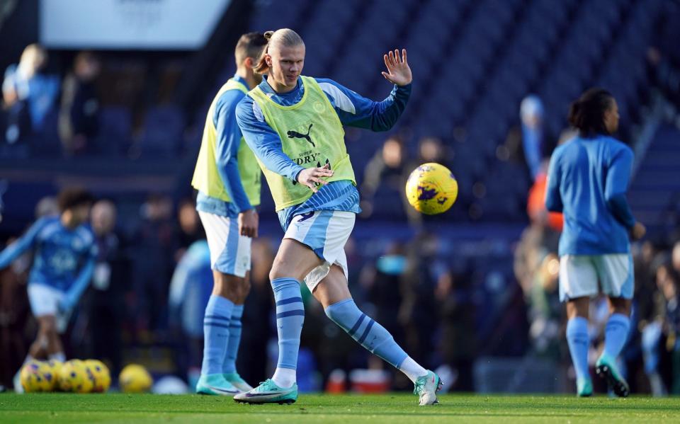 Manchester City's Erling Haaland warms up ahead of the Premier League match at the Etihad Stadium