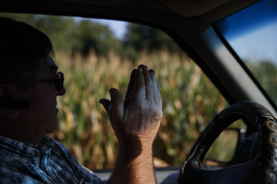 Richard Wilkins describes how his struggling corn crop needs rain as he sits in his truck next to a cornfield in his Greenwood, Del., farm Monday, July 29, 2019. "We're trying to do what we can," said Wilkins, who shuns the federal farm habitat programs, but hopes that leaving what weeds and wildflowers survive in hard-to-mow areas helps wildlife. (AP Photo/Carolyn Kaster)