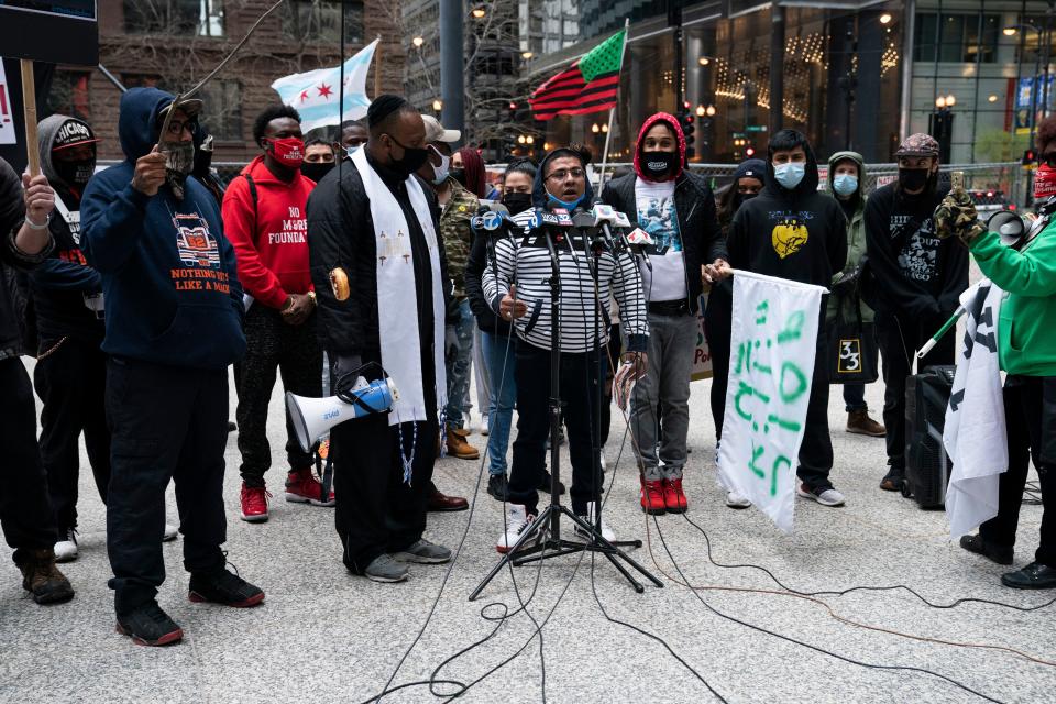 Demonstrators gather in Freedom Plaza in downtown demanding justice for 13-year-old Adam Toledo, who was killed last month by a Chicago police officer on April 14, 2021.