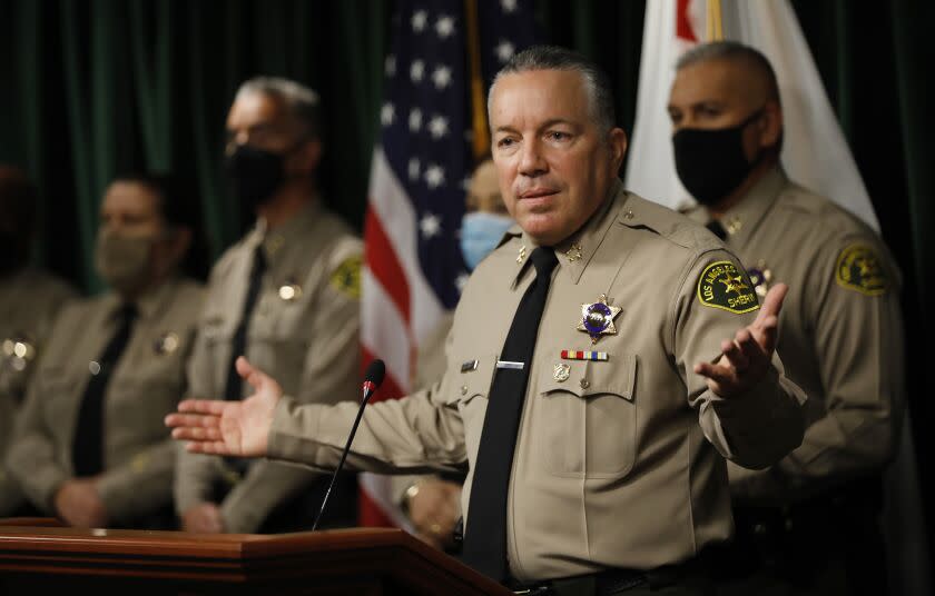 LOS ANGELES, CA - MAY 26: Los Angeles County Sheriff Alex Villanueva discusses organizational change, transparency, accountability and how they relate to the issue of deputy cliques during a press conference at the Hall of Justice Wednesday May 26, 2021. The Sheriff also addressed a damages claim filed by the city of Compton against Los Angeles County today, alleging the sheriff's department has bilked the city out of millions of dollars by falsely reporting the amount of time deputies spend patrolling the city. Sheriff Alex Villanueva dismissed the allegations. "We have about 45 contracts and we measure the minutes, and there's a rate -- we have to get close to 100%, either slightly above or slightly below,'' Villanueva said. "If we're missing that target, I don't think it's going to be the grand conspiracy that the outgoing mayor of Compton wants it to be. "But we'll definitely take the allegation seriously, and we are already doing a thorough audit on it, and we'll take action based on the results of that. Nothing unusual there. But to call it a fraud, that might be a little bit of a stretch.'' Hall of Justice on Wednesday, May 26, 2021 in Los Angeles, CA. (Al Seib / Los Angeles Times).