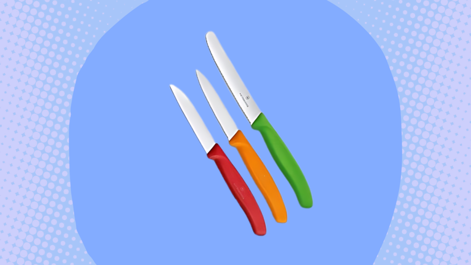 The three Victorinox knives on a light blue and purple background