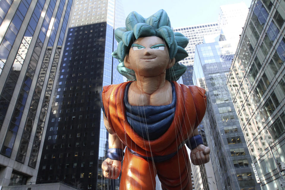 FILE - In this Nov. 22, 2018 file photo, a balloon depicting Goku, from the "Dragon Ball" manga series, makes its way down Sixth Avenue during the 92nd annual Macy's Thanksgiving Day Parade in New York. "Dragon Ball” is a revered anime that has influenced pop culture for years, earning praise from the likes of Michael B. Jordan, Ronda Rousey and Chris Brown, showing up in end zone celebrations. With the new film "Dragon Ball Super: Broly" releasing this week in the U.S., the franchise’s popularity with its famous and non-famous fans is likely to grow. (AP Photo/Tina Fineberg, File)