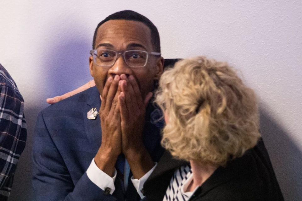 Candidate for Salem City Council Ward 1 Irvin Brown reacts as initial results are released Tuesday evening.