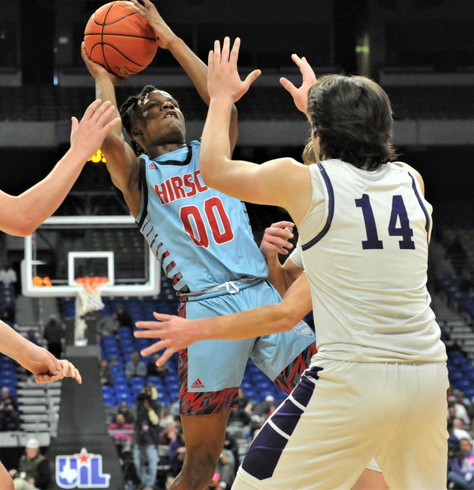 Hirschi's Ernest Young shoots over Boerne's Houston Hendrix during the 2022 UIL Boys Basketball State Championship at the Alamodome in San Antonio on Thursday, March 10, 2022.