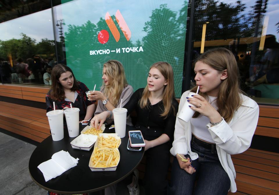 People visit the newly opened Vkusno & tochka restaurant in a former McDonald's outlet in Pushkinskaya Square, on June 12, 2022 in Moscow, Russia.