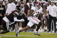 Alabama running back Jase McClellan (2) is pursued by Mississippi State linebacker DeShawn Page (0) during the first half of an NCAA college football game, Saturday, Sept. 30, 2023, in Starkville, Miss. (AP Photo/Rogelio V. Solis)