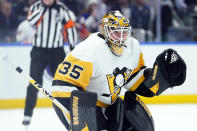 FILE - Pittsburgh Penguins goaltender Tristan Jarry protects his net during the second period of an NHL hockey game against the New York Islanders, Tuesday, Dec. 27, 2022, in Elmont, N.Y. The Pittsburgh Penguins decided to bring back two-time All-Star goaltender Tristan Jarry, signing him Saturday, July 1, 2023 to a $26.875 million, 5-year deal with a $5.375 million annual cap hit through 2028.(AP Photo/Frank Franklin II, File)