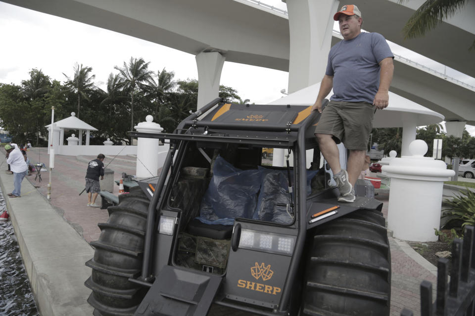 An amphibious vehicle will be loaded on to The Globe bound for the Bahamas along with other much needed food, water and other supplies. Chef José Andres' World Central Kitchens is loading up the vessel with the supplies for the victims of Hurricane Dorian that devastated the Bahamas.(Jose A. Iglesias/Miami Herald via AP)